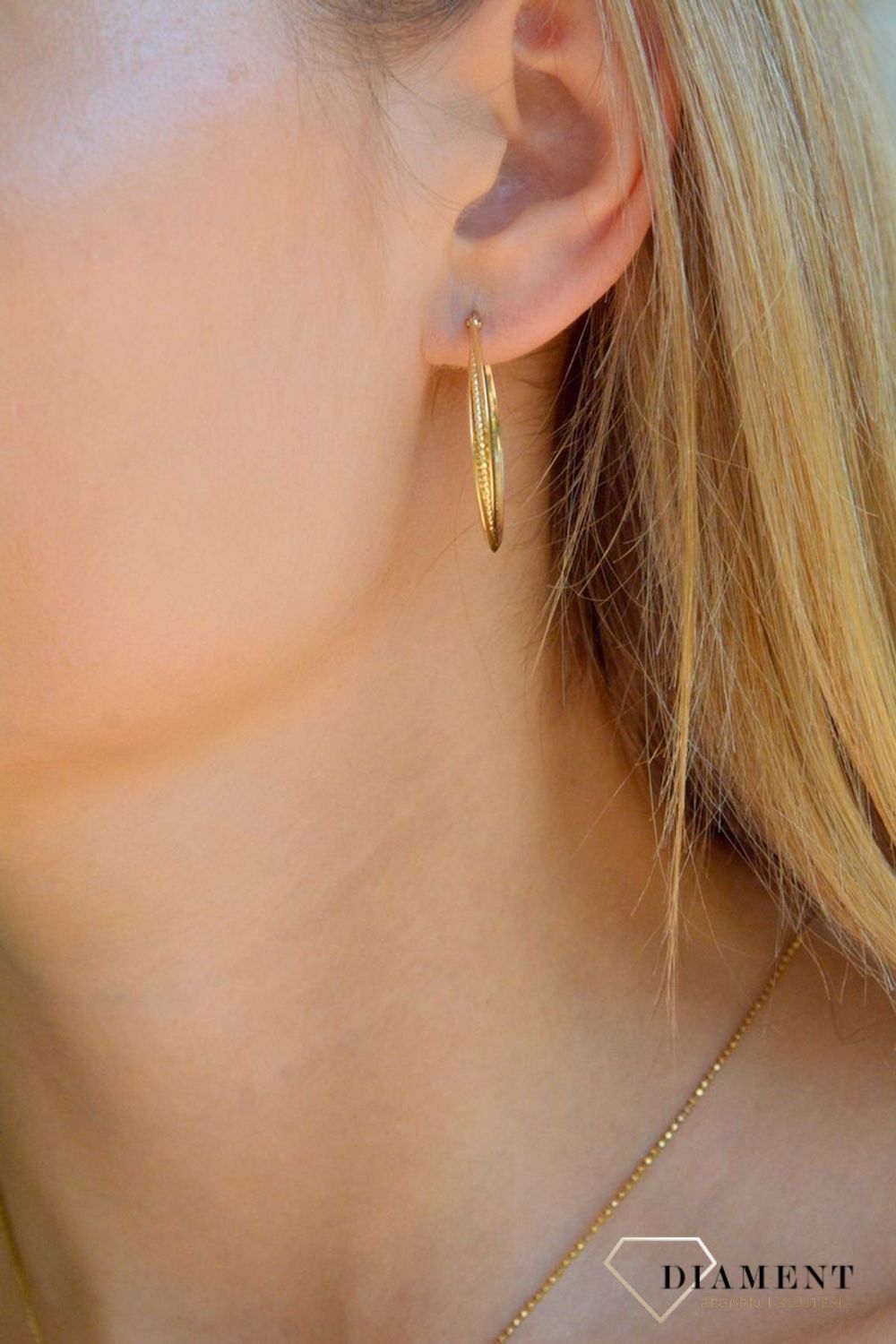 Złote kolczyki damskie 375 owalne grawerowane KL 10912 375.jpg